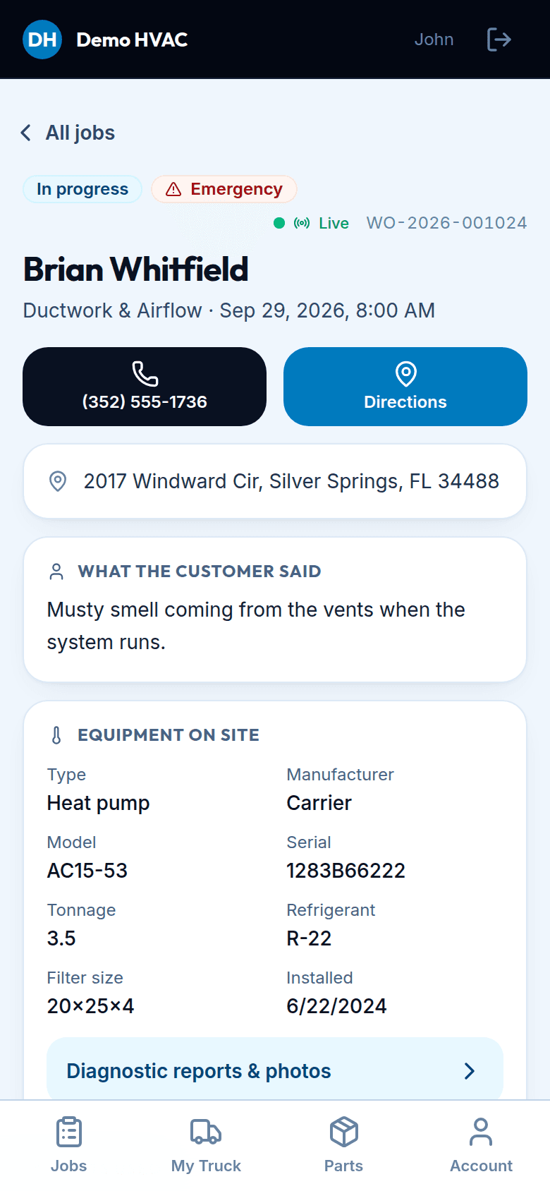 A job on the technician's phone: customer, address, what the customer said, equipment on site with model and serial, diagnostic reports and photos.